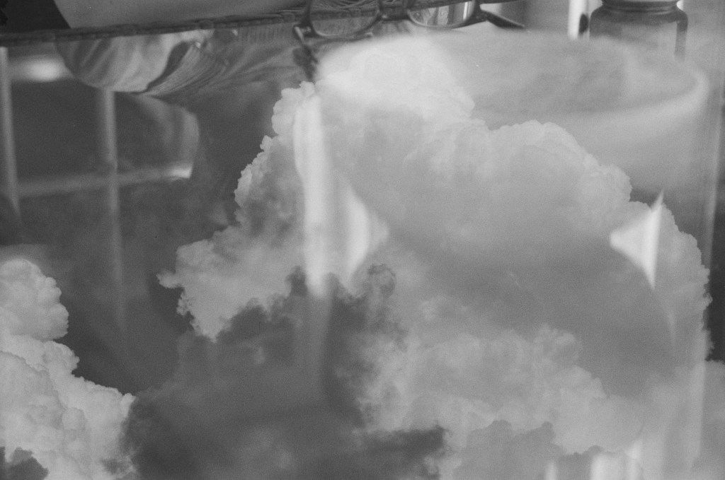 Double exposure of a poet friend whose face is obscured by clouds